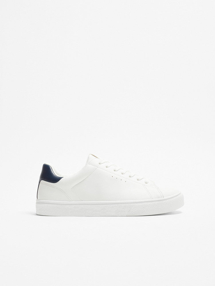The Everyday White Sneaker — Navy Heel