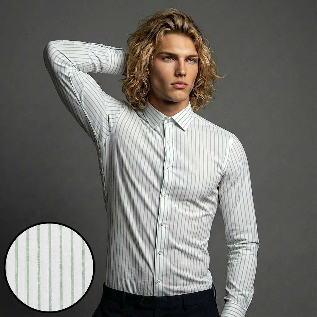 Man wearing a white dress shirt with green stripes against a gray background