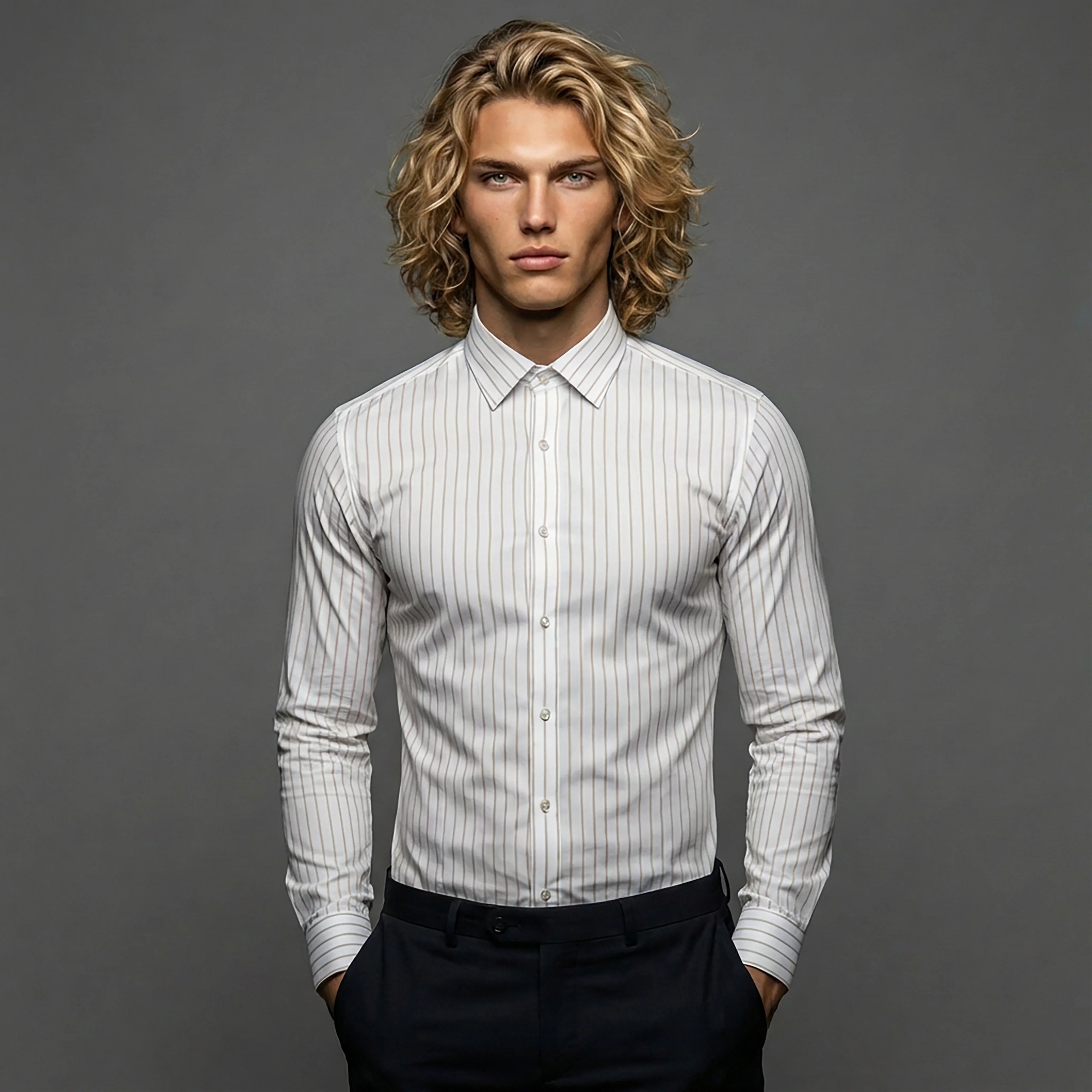 Man in a slim fit white striped dress shirt and black pants on gray background, DGMAH fashion